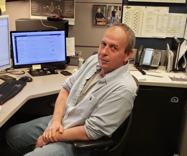 Another Engineer Obsess—err, Hobby: Woodworking with Russell Motes 14 Russel at desk